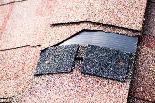 Shingle That Has Been Damaged And Needing Replacement — URB’n Roofing In Gumdale, QLD